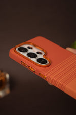 Samsung Galaxy S26 Ultra Carbon Texture Case with Gold Camera Ring — Terracotta Orange